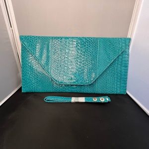Turquoise alligator skin purse
Never used